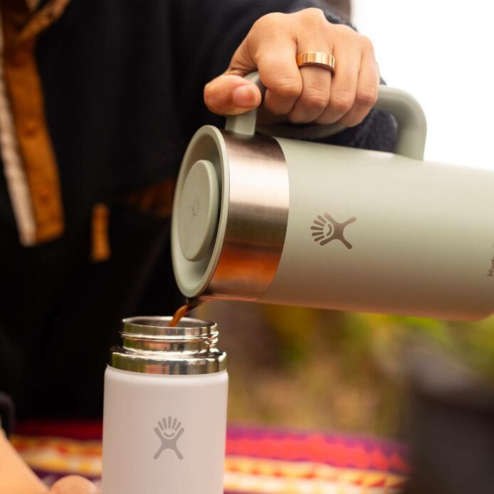 32-oz-insulated-french-press-i5 2706_johnson_s25summertravel_camping_pouring_303a0287_1_.jpg